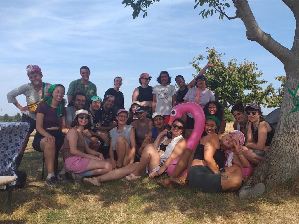 Group picture of attendees at an community farming retreat -cropped Group picture of attendees at an community farming retreat